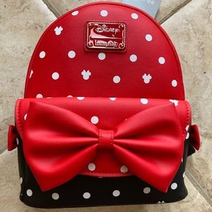 Disney Loungefly black and red backpack with white Minnie Mouse polka dots